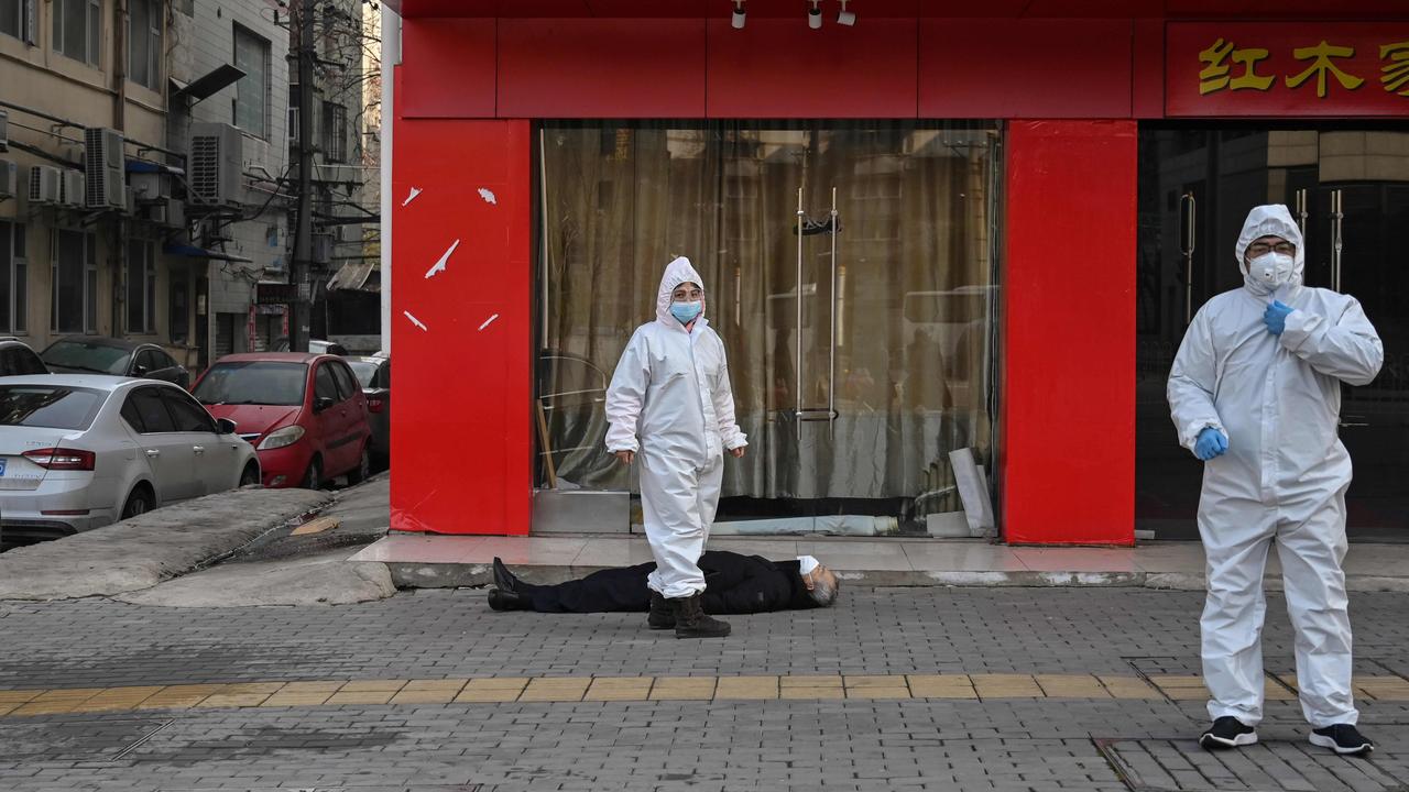A man who allegedly died on a street near a hospital in Wuhan. Picture: Hector Retamal/AFP