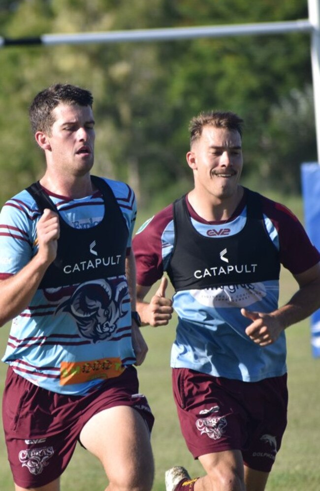 CQ Capras’ players Blake Moore and Cooper Marshall put in the hard yards at training.