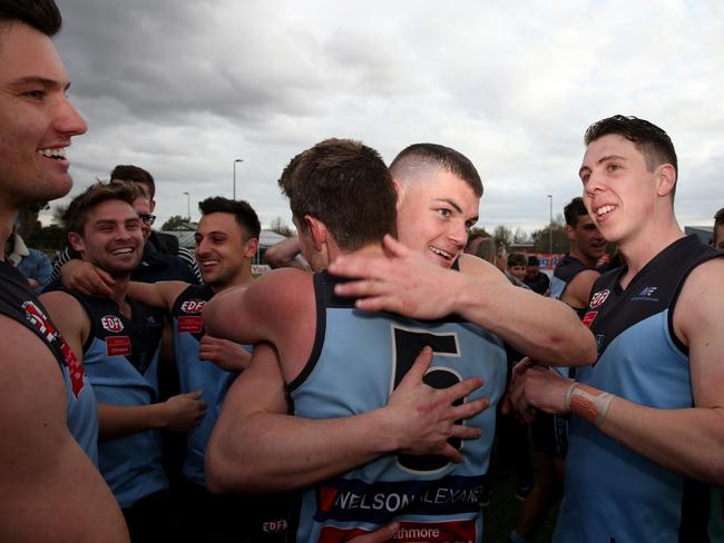 Aberfeldie players celebrate after their win in the EDFL Premier Division grand final.