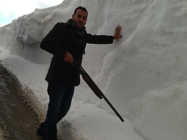 Dib Barakat pictured holding a firearm despite Victoria Police slapping him with a Firearm Prohibition Order.