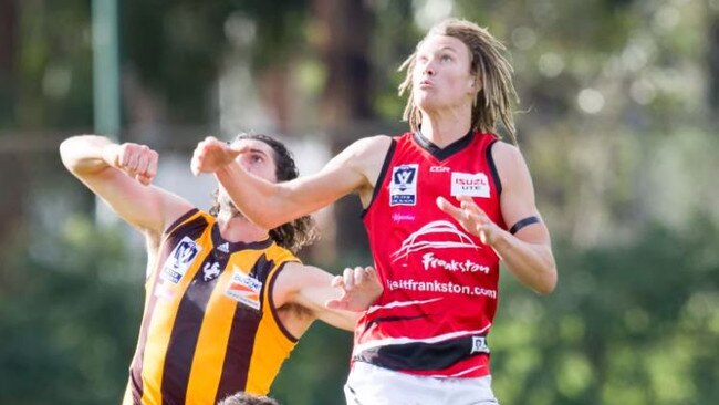 Walmsley flies for a mark while playing for Frankston.