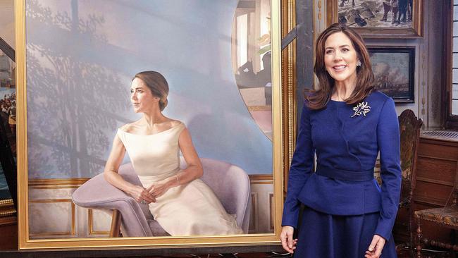 Crown princess Mary of Denmark reveals a painting of herself during the opening of the exhibition "HRH Crown Princess Mary 1972 – 2022" at the National History Museum at Frederiksborg Castle in Hillerod, Denmark. Picture: AFP