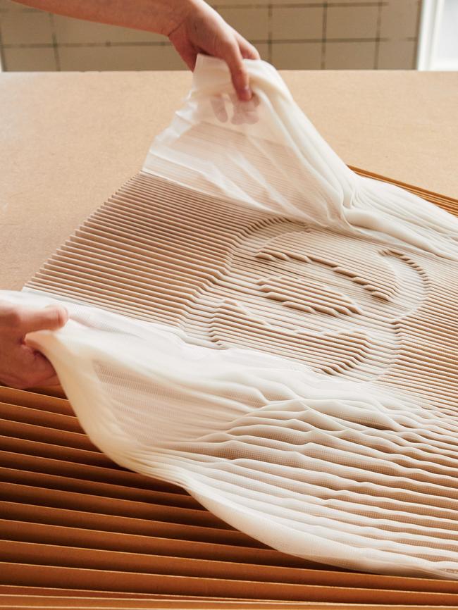 Silk accordion pleating with a Chanel motif relief at Les Ateliers Lognon. Photography: Holly Gibson