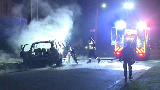 Firefighters work to extinguish the car fire on Monday night. Picture: TNV