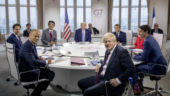 World Leaders prepare to start a working session on World Economy and Trade on the second day of the G7. Picture: AP