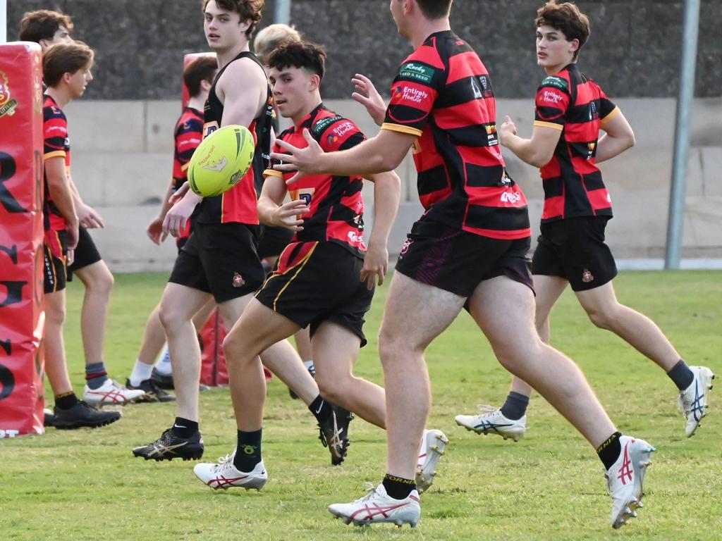 Rockhampton Grammar halfback Callum Denman (centre).