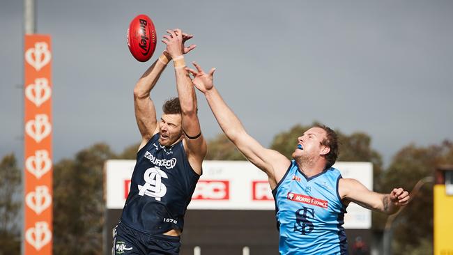 Sturt's Jack Osborn spoils South's Tom Fields. Picture: AAP Image/MATT LOXTON