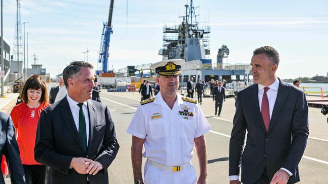 Richard Marles, Vice Admiral Jonathan Mead and Peter Malinauskas discuss the build of the AUSKUS submarines at the Osborne Naval Shipyard. Picture: NCA NewsWire / Brenton Edwards