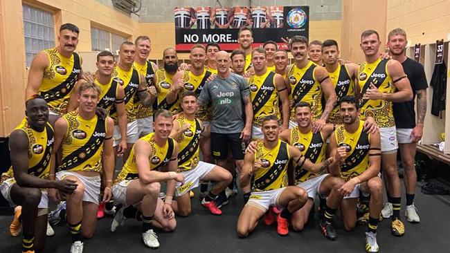 Greg 'Clanger' Kleynjans with the Richmond team after the 2017 grand final