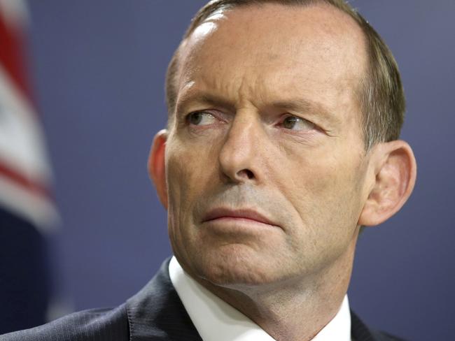 FILE - In this Sept. 19, 2014, file photo, former Australian Prime Minister Tony Abbott speaks during a press conference, in Sydney. Prime Minister Malcolm Turnbull said Monday, Feb. 27, 2017, that comments by Abbott in a speech last week that the conservative government risked a 
