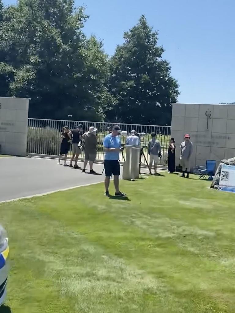 A small media pack had gathered outside the gates. Photo: Facebook