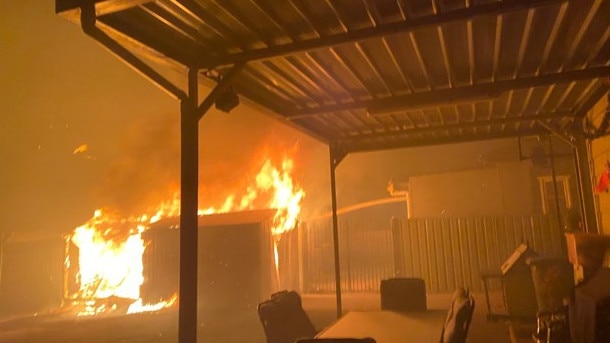 Charmhaven bushfire: Structure on fire in Birdwood Drive at Blue Haven on New Year's Eve.