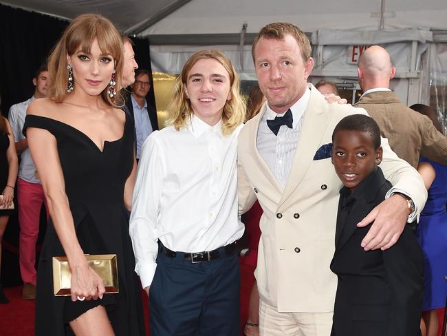 Family ... Guy Ritchie and wife Jacqui Ainsley with Rocco Ritchie and David Banda. Picture: Splash News