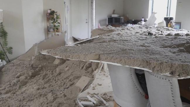 **MUST CREDIT NINE NEWS** A mother and four children are homeless after their ceiling collapsed on a rainy and windy night. The ceiling had collapsed over the dining room table where her four young children were having dinner just hours earlier. Picture: Nine News