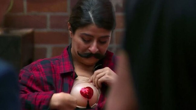 Susie Youssef matches her faux facial hair to her nipple tassel in a clever use of props. Picture: Supplied.