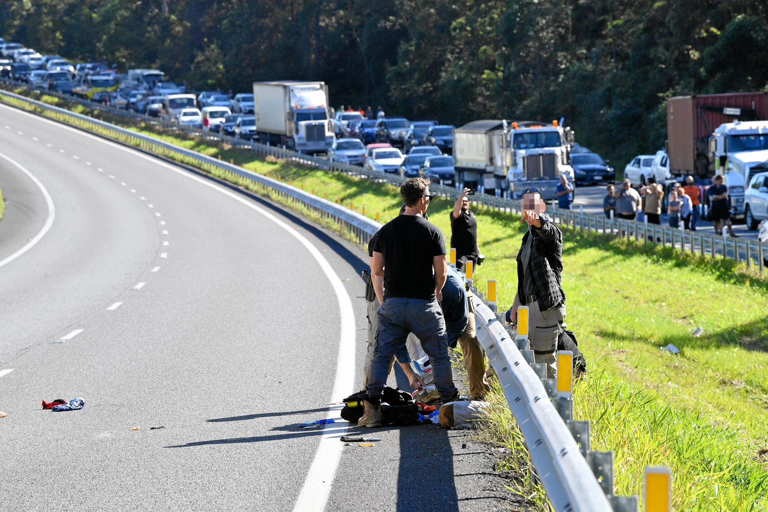 The police chased a car from north of Gympie and dozens of police apprehended a man near Parklands, just north of Nambour on the Bruce Highway. Traffic was stopped in both directions for several hours.