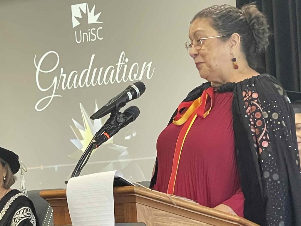 Aunty Karen Hall conducts the Welcome to Country ceremony at the University of the Sunshine Coast graduation ceremony at the Beach House Hotel on October 12, 2023.