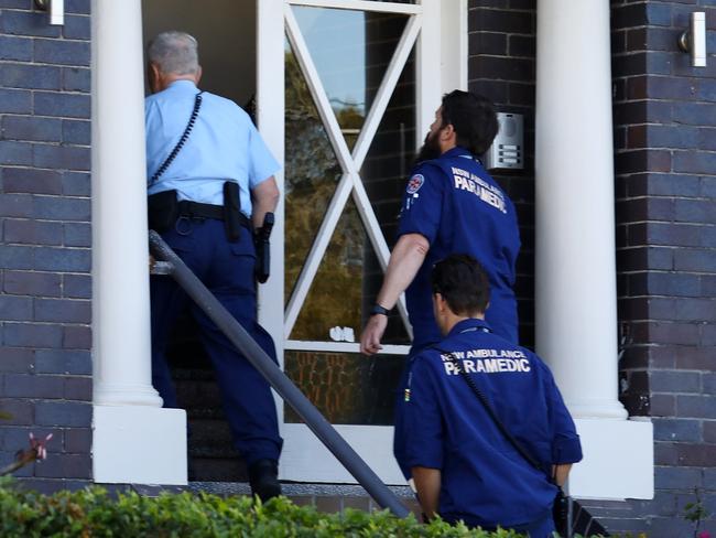 Police and paramedics head into Marais’ eastern suburbs apartment block. Picture: M