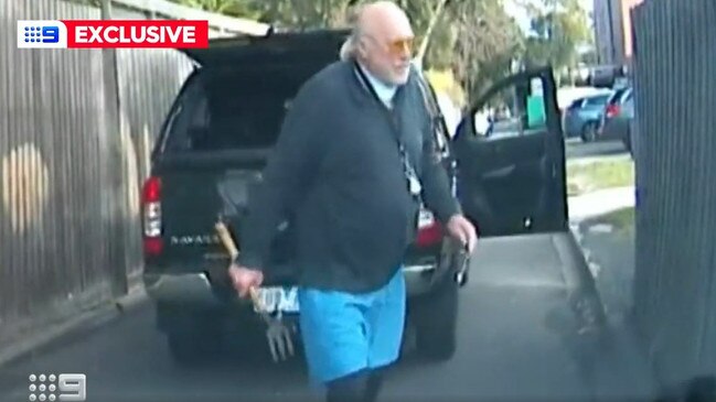 Rex Hunt wielding a garden fork in his alleged road rage incident.