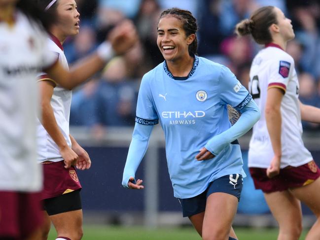 MANCHESTER, ENGLAND - OCTOBER 06: Mary Fowler of Manchester City Women celebrates scoring her team's second goal during the Barclays Women's Super League match between Manchester City and West Ham United at Joie Stadium on October 06, 2024 in Manchester, England. (Photo by Ben Roberts Photo/Getty Images)