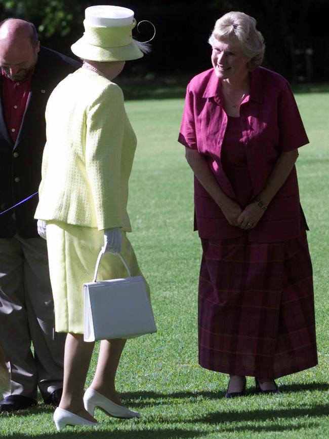 The Queen greets Lesley Mackness at Government House, Adelaide during the royal visit to South Australia in February 2002.