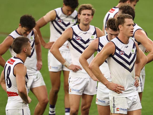 PERTH, AUSTRALIA - MAY 02: Nat Fyfe of the Dockers looks on with the team after being defeated during the round seven AFL match between the West Coast Eagles and the Fremantle Dockers at Optus Stadium on May 02, 2021 in Perth, Australia. (Photo by Paul Kane/Getty Images)