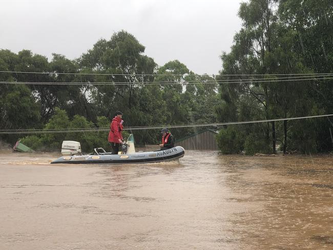 A boat rolls through Lismore.
