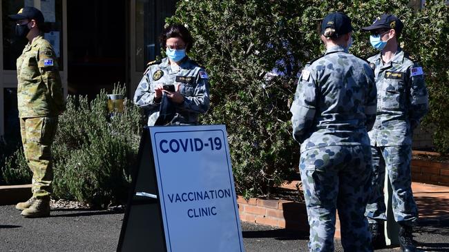 Defence force personnel outside a COVID-19 vaccination clinic in Dubbo on Friday. Picture: Getty Images