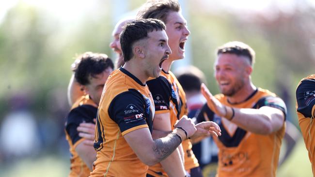 Tigers players celebrate the win. Picture: Sue Graham