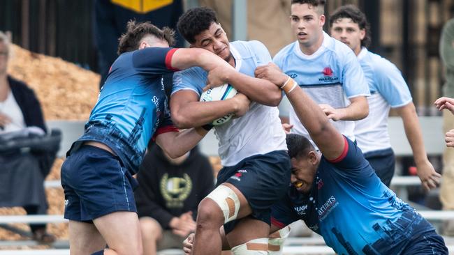 Clem Halaholo barging his way to the touch line.