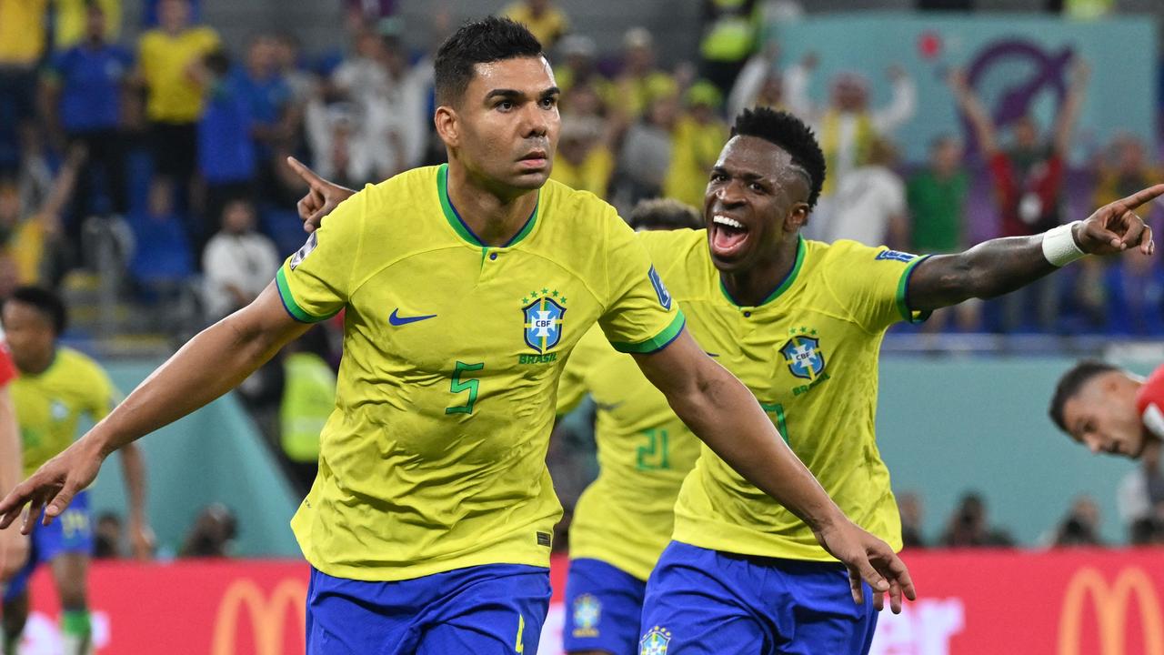 Casemiro celebrates with Brazil's forward Vinicius Junior after he scored his team's winner. Picture: AFP