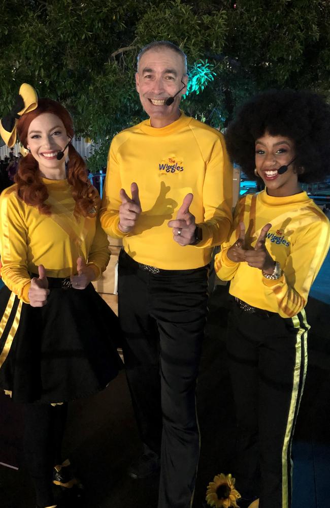 The Yellow Wiggles at Carols in the Domain – Emma Watkins, Greg Page and Tsehay Hawkins. Picture: Supplied