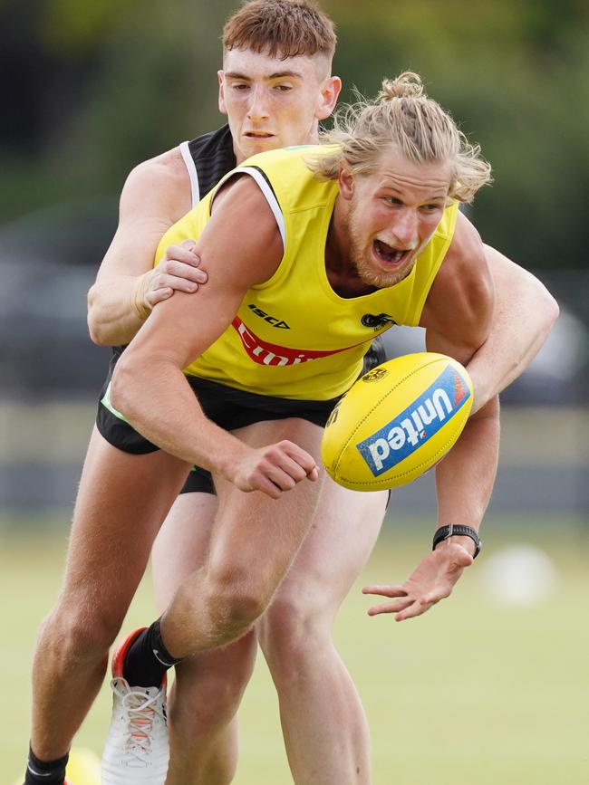 Recruit Tom Wilson gets stuck into it.