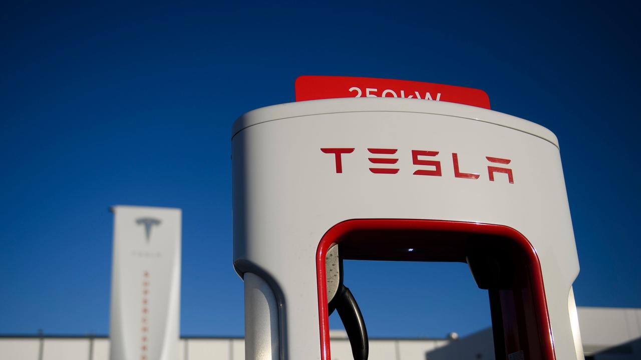 A 250kW electric vehicle charging station at the Tesla Inc. supercharger station.expected fourth quarter earnings. (Photo by Patrick T. FALLON / AFP)