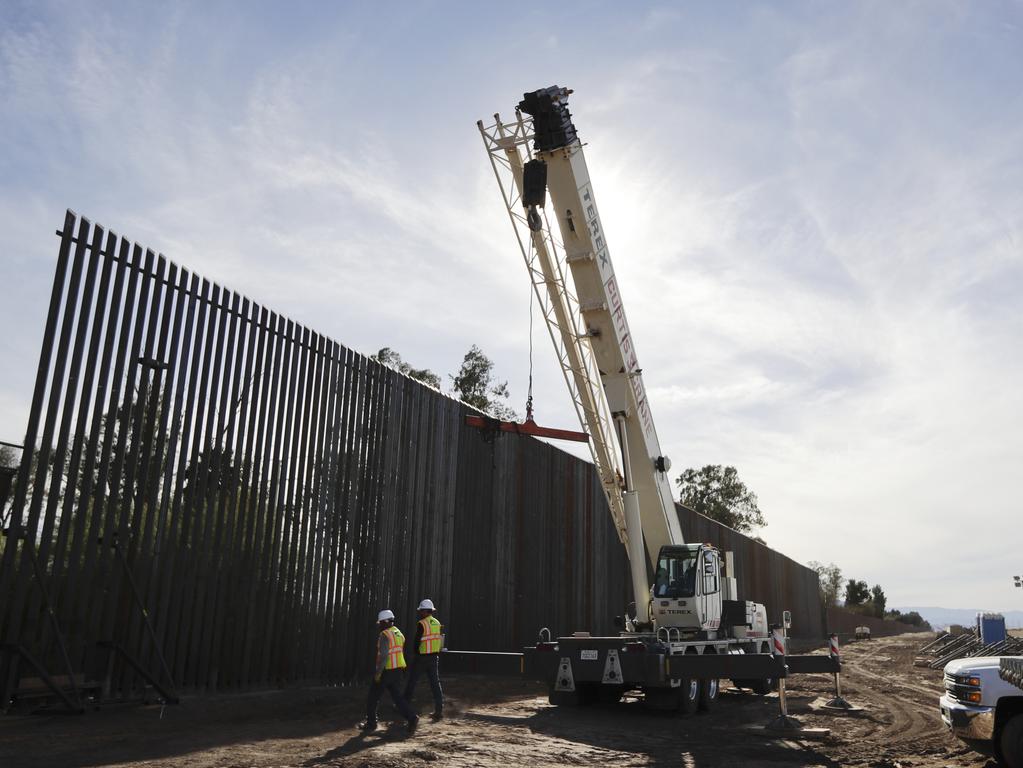 Construction continues on a new, taller version of the border structure in Calexico, California.  Picture:  AP