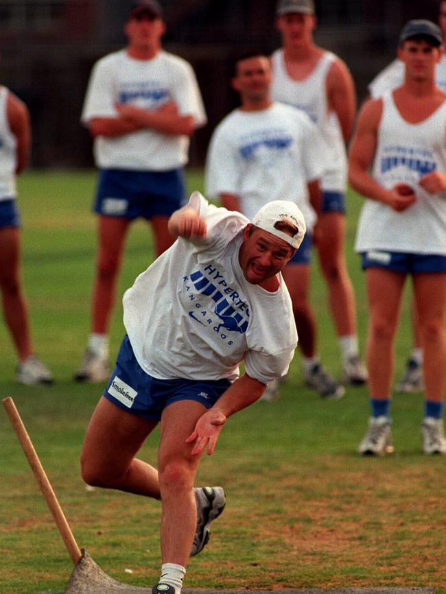 North Melbourne take time out from training to play some cricket.