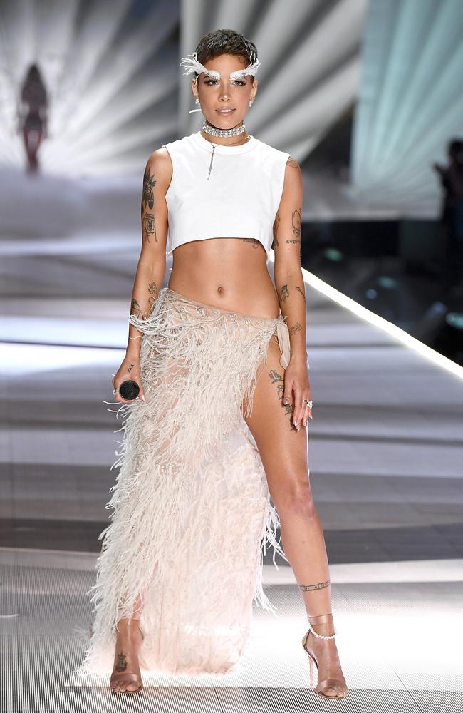 Halsey performs on the runway during the 2018 Victoria’s Secret Fashion Show at Pier 94 on November 8, 2018 in New York City. (Photo by Dimitrios Kambouris/Getty Images for Victoria’s Secret)