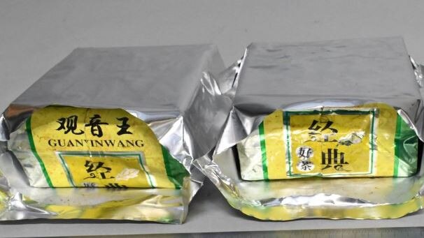 Fifty-six kilograms of methamphetamine and 13 kilograms of heroin were identified in a consignment of green tea and magnets sent from Thailand in March 2022. George Marrogi and his girlfriend, Antonietta Mannella have been charged with major drug importation offences. Picture Australian Federal Police