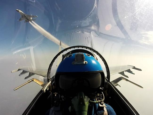 Two Chinese jet fighters during a military drill in the South China Sea near China's Hainan Island. Picture: AFP