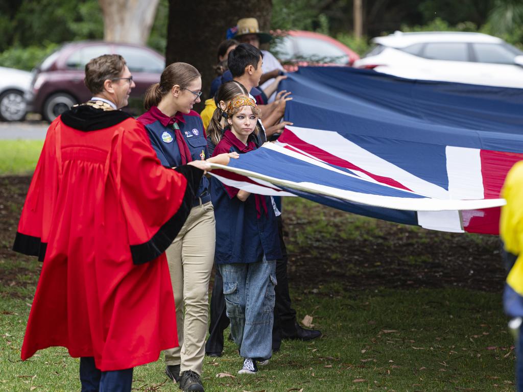 The giant Australian flag is raised as part of Toowoomba Australia Day celebrations at Picnic Point, Sunday, January 26, 2025. Picture: Kevin Farmer