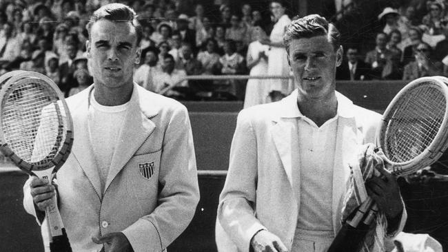 Tennis players Vic Seixas of America and Australia's Frank Sedgman walk onto the court for their singles match during Davis Cup tie at Memorial Drive in December 1952. 