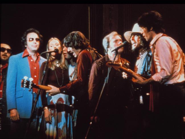 Dr John, Neil Diamond, Joni Mitchell, Neil Young, Rick Danko, Van Morrison, Bob Dylan and Robbie Robertson in 1978 documentary film The Last Waltz.