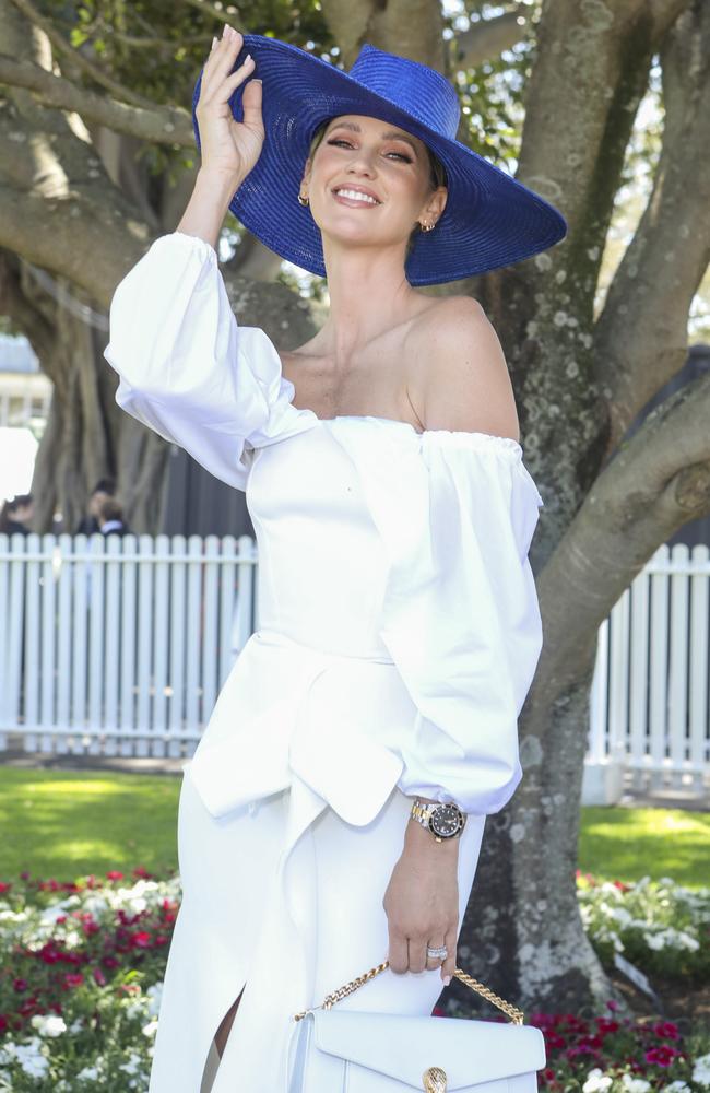 Model Nikki Phillips also went for a white ensemble, similar to Lillian and Simone, but incorporate blue in a statement hat. Picture: Media Mode