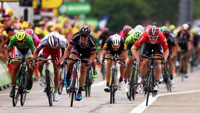 Andre Greipel of Germany and Lotto-Soudal crosses the finish line ahead of (R to L) John Degenkolb of Germany and Team Giant-Alpecin, Alexander Kristoff of Norway and Team Katusha and Peter Sagan of Slovakia and Tinkoff-Saxo to win Stage 15 of the Tour de France.