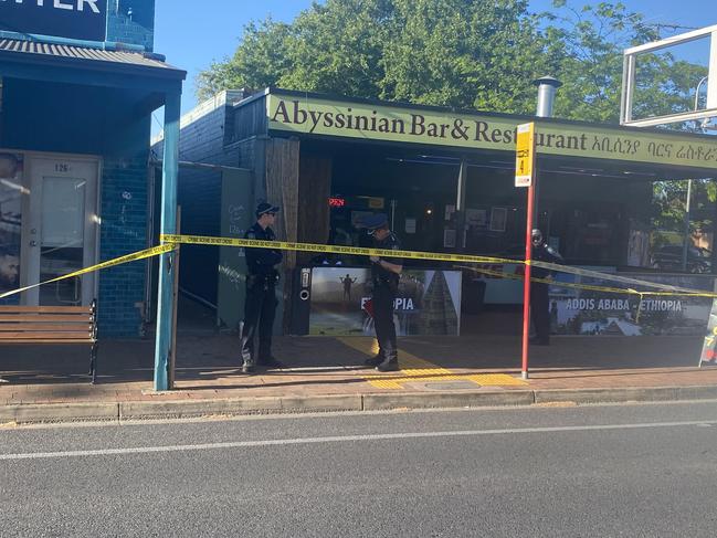 Police outside the Abyssinian Bar & Restaurant on Henley Beach Rd