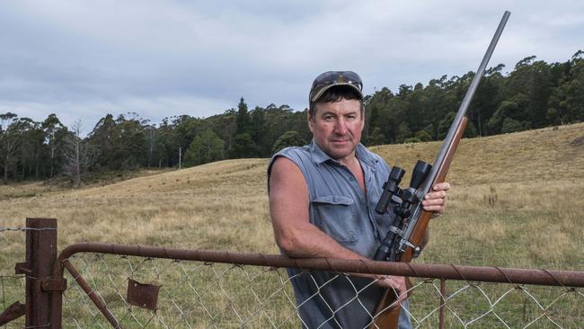 Farmer Mike Johnston, on his Meander property yesterday with a Ruger rifle, supports a relaxation of gun laws. Picture: Chris Crerar