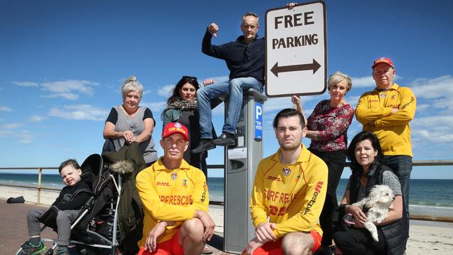 Elsje Coles, Valerie Germanos, Andrew Baines, Angela Vaughan, Roy Menner, Lachlan McCormack, 3, Stephen Forest, Joey Loielo, and Kenzie Vandenieuwelaar at Henley Beach. Picture: AAP Image/ Dean Martin