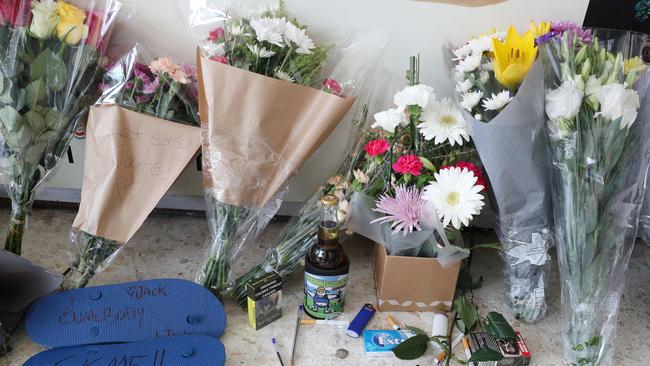 Flowers, handwritten notes and other items left by Jack’s friends. Picture: Liam Kidston.