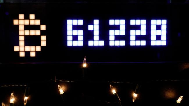 Bitcoin’s price displayed at a New York bar just weeks before it smashed that figure. Picture: AFP