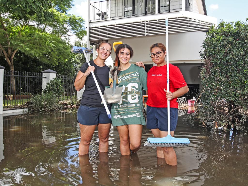 Kesena Brady, Seoro Brady and Vonu Libitino in front of their home in Elizabeth St, Paddington. Picture: Zak Simmonds